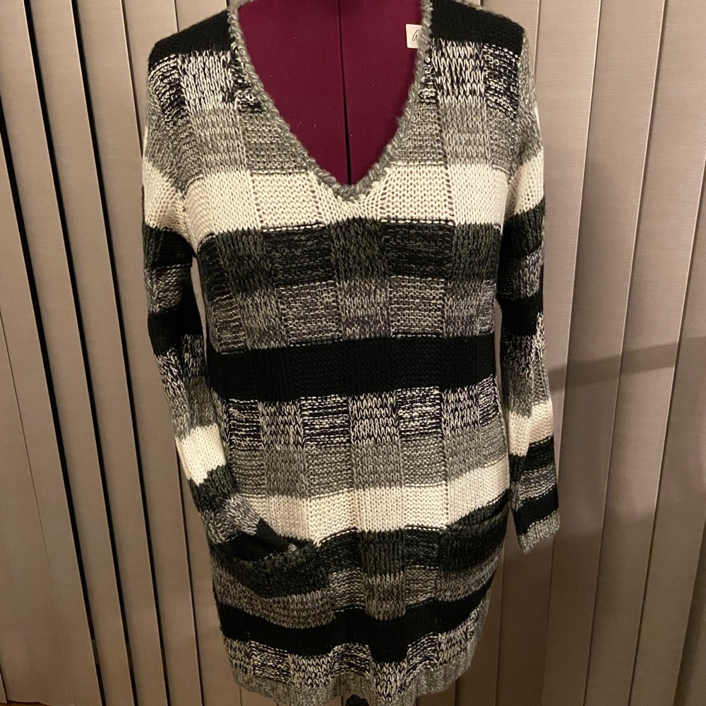 Striped V neck long sleeve sweater dress.